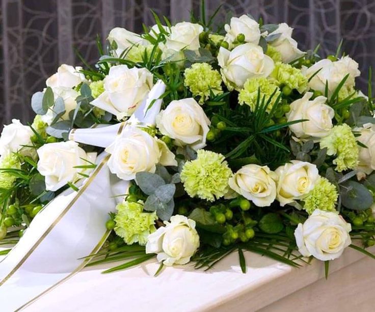 
flores de condolencia, coronas velorio, arreglo floral funeral